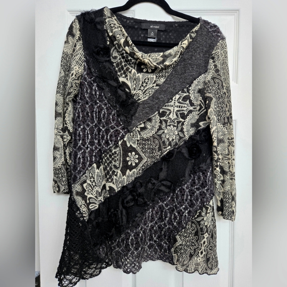 Align miles sweater.   Size Medium